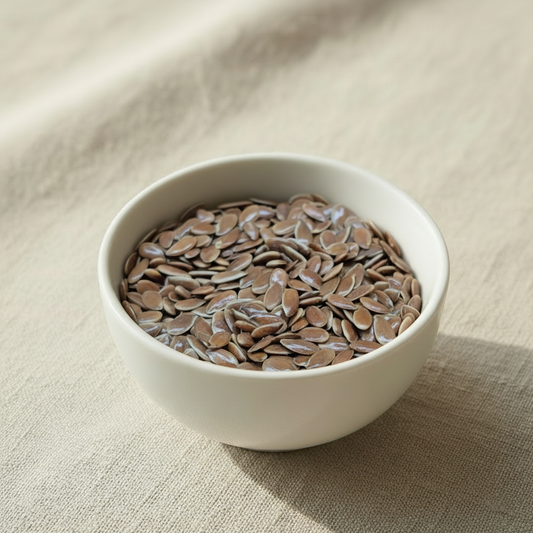 Flax Seeds in a ceramic bowl on linen